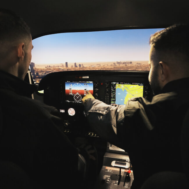 Flight instructor guiding a student pilot through simulated flight procedures in preparation for a CASA flight test.