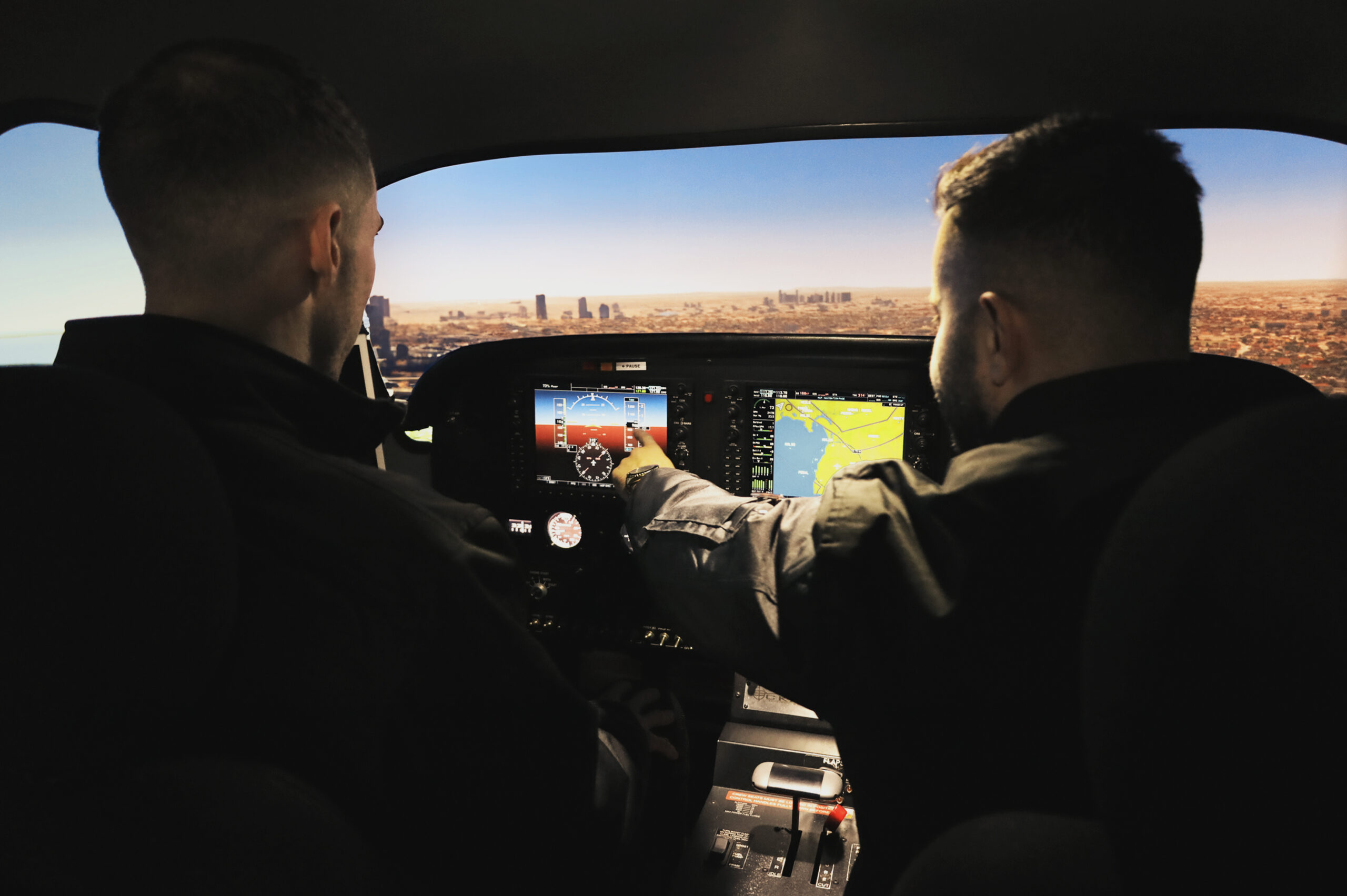 Flight instructor guiding a student pilot through simulated flight procedures in preparation for a CASA flight test.