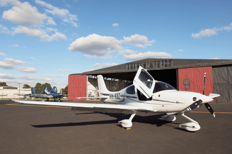 Two Cirrus aircraft parked outside a hangar at Avia Aviation, ready for pilot licence conversion training in Australia.
